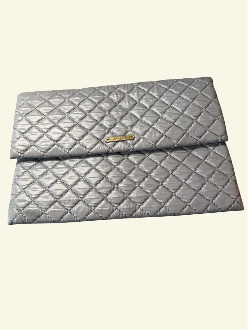 Do everything in Love Quilted Silver Clutch Purse